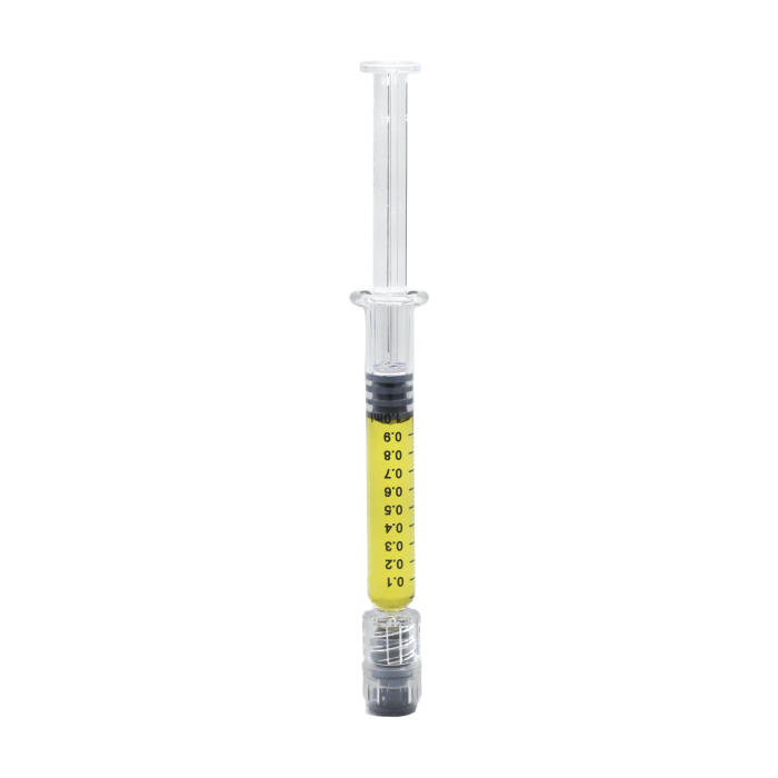 clear syringe with amount labels filled with yellow concentrate